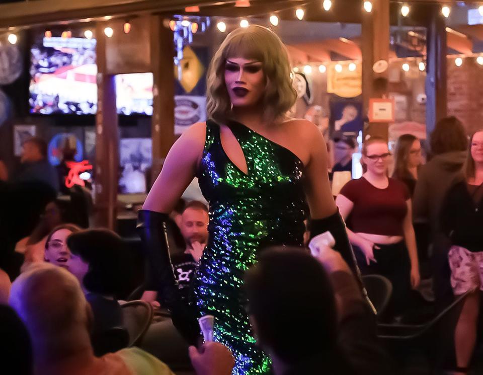 Aaliyah Nouveau in performs in front of the crowd at Cafe DaVinci at the club's weekly Pride Night event in DeLand. LGBTQ advocates say such events could be censored if Gov. Ron DeSantis signs a new anti-drag bill into law.