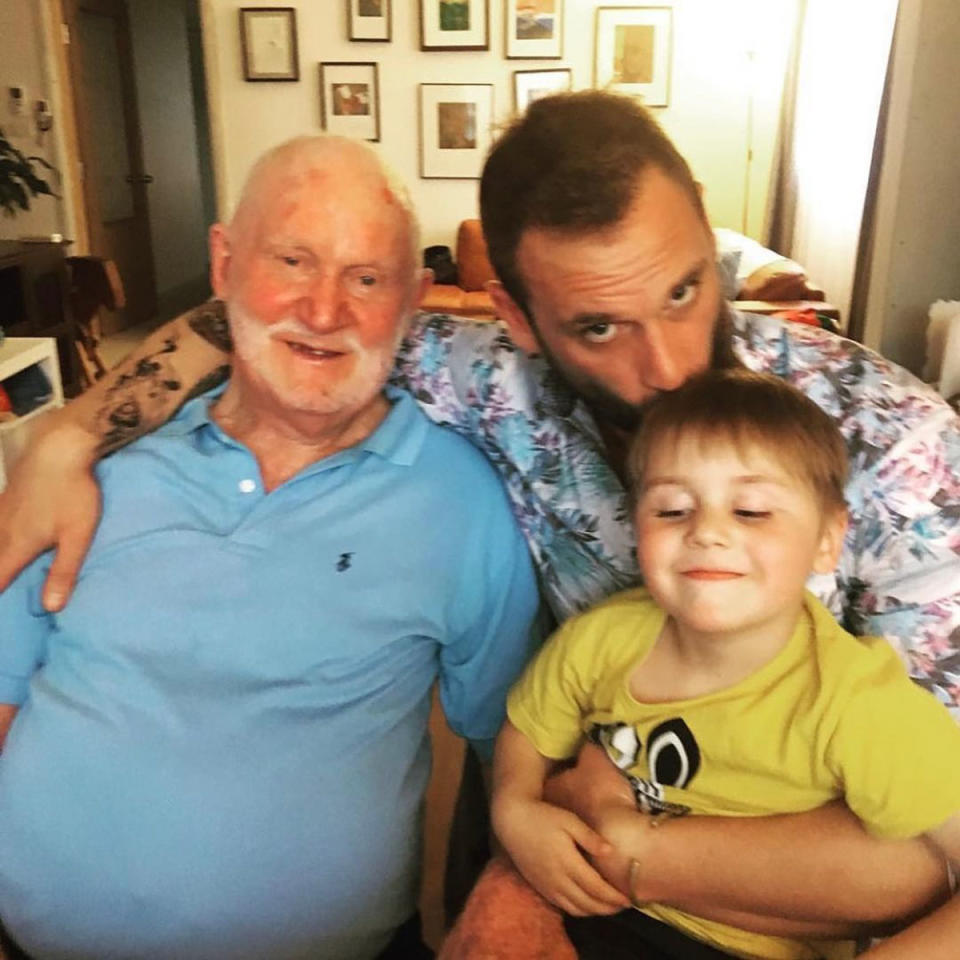 Jake Ryan, his Pop and his son on a couch