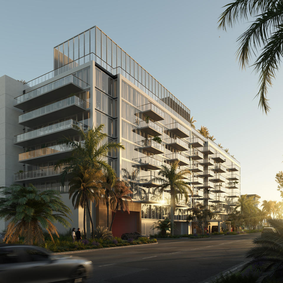 The eight-story glass-walled building has 66 residences and 22,000 square feet of amenities.