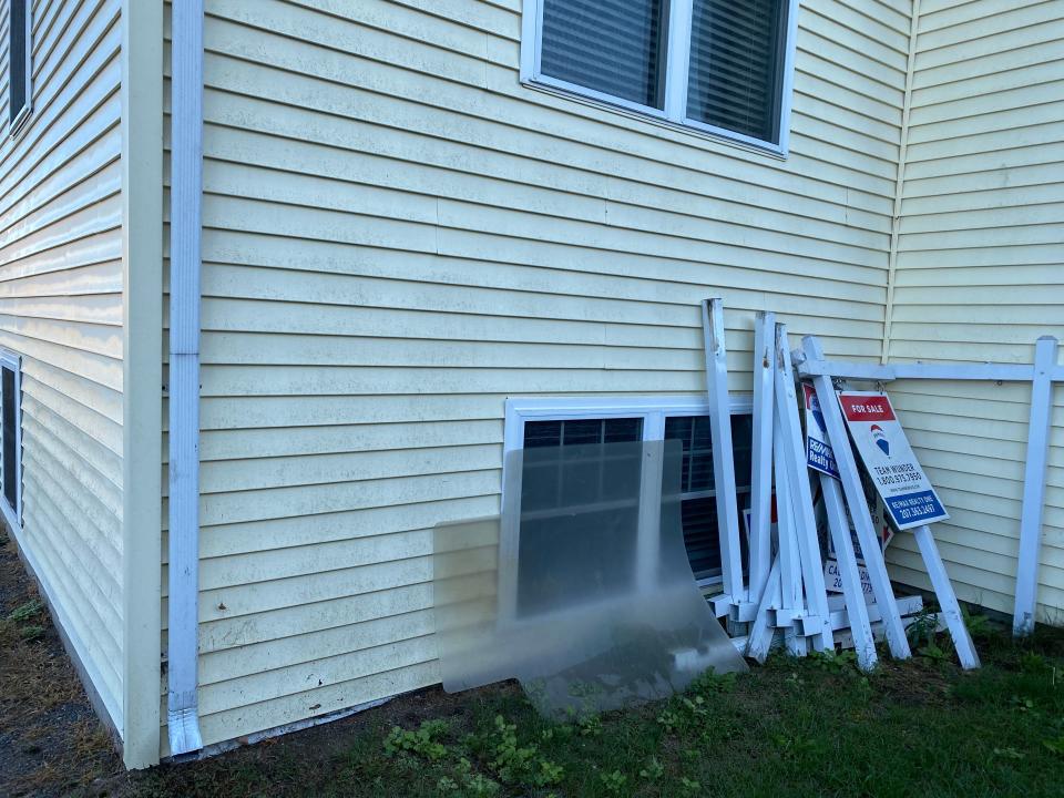 Several neighbors are complaining about a black fungus that is coating their homes, which they claim is due to Wiggly Bridge Distillery in York.