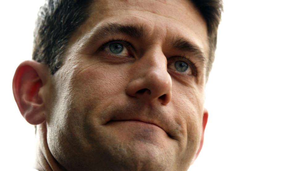 House Budget Committee Chairman Paul Ryan listens as members of the Republican leadership speak to reporters after U.S. President Barack Obama met with the House Republican Conference at the White House in Washington June 1, 2011. REUTERS/Kevin Lamarque