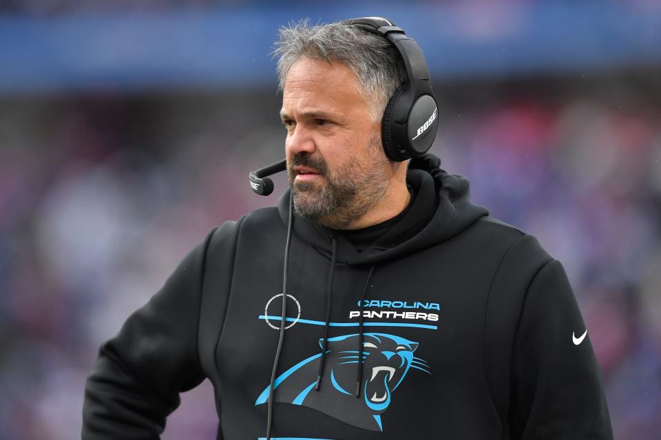 Carolina Panthers head coach Matt Rhule works the sidelines in the first half of an NFL football game against the Buffalo Bills, Sunday, Dec. 19, 2021, in Orchard Park, N.Y. (AP Photo/Adrian Kraus)