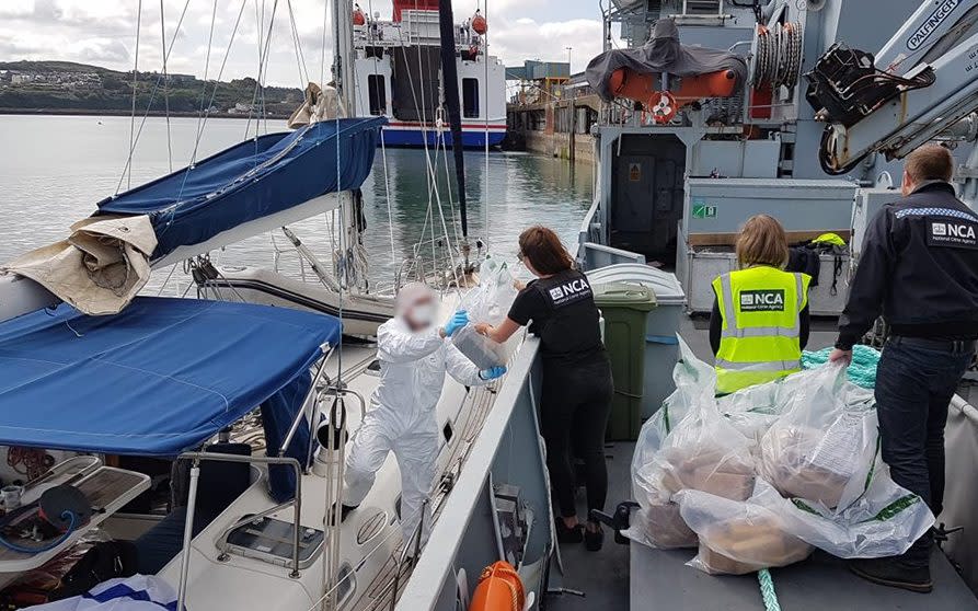 National Crime Agency (NCA) of NCA Officers seizing £60 million worth of cocaine on a yacht off the Welsh coast - PA