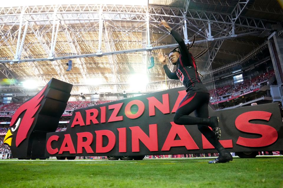 Oct 20, 2022; Glendale, Arizona, USA; Arizona Cardinals wide receiver DeAndre Hopkins waves to the cheering fans as he makes his return after a six game suspension against the New Orleans Saints at State Farm Stadium. Mandatory Credit: Rob Schumacher-Arizona Republic