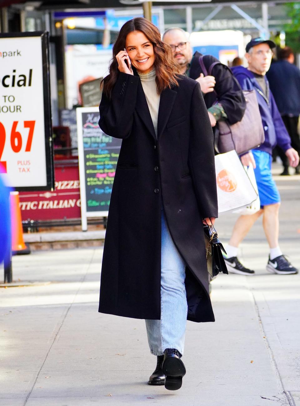 Holmes wearing a Wardrobe.NYC coat in New York City on October 15, 2019.