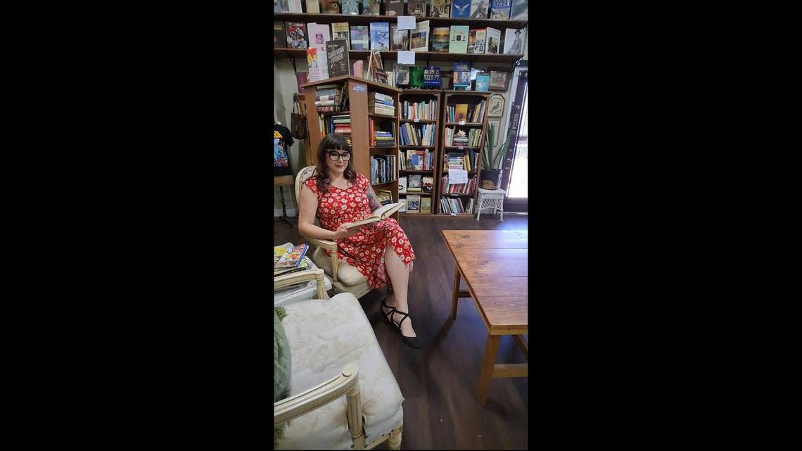 Vanessa Garabedian, owner of Bookish, reads in her Tower District bookstore.