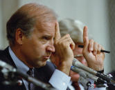 FILE- In this Oct. 12, 1991, file photo Senate Committee Chairman Joseph Biden, D-Del., gestures during hearings before the committee on allegations of sexual harassment by Supreme Court nominee Clarence Thomas on Capitol Hill in Washington. Thomas issued fresh denials that he ever sexually harassed former aide Anita Hill. (AP Photo/Greg Gibson, File)