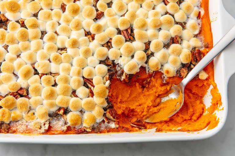 <p>It's hard to mess with a classic. The caramelized marshmallow topping has earned a legion of loyal fans for a reason. </p><p><em>Get the recipe at <a href="https://www.delish.com/cooking/recipe-ideas/a21960705/best-sweet-potato-casserole-marshmallows-pecans-recipe/" rel="nofollow noopener" target="_blank" data-ylk="slk:Delish;elm:context_link;itc:0;sec:content-canvas" class="link ">Delish</a>.</em></p>