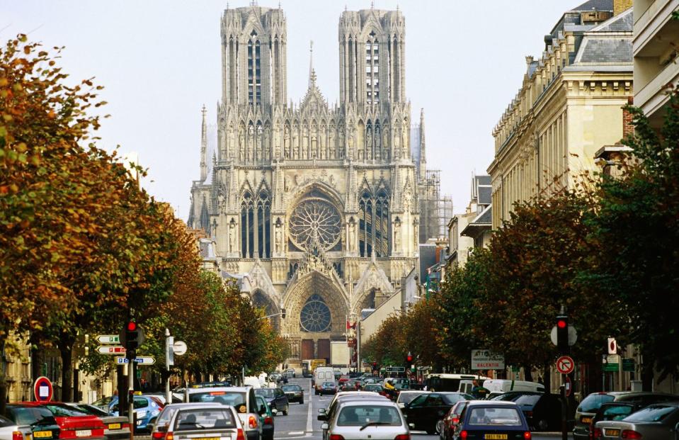 <p>Also called the Cathedral of Notre Dame at Reims, the French High Gothic style structure is a historical landmark for many reasons. It was the sight of 25 coronations of the kings of France, from the 13th to 19th centuries, most notably of Louis VIII in 1223 and Charles VII in 1429 in the presence of Joan of Arc.</p><p>Construction of Reims Cathedral began in 1211, and while it was modeled on the Chartes Cathedreal, Reims incorporated several new architectural techniques of its time, such as bar tracery, which later became a signature element of French High Gothic architecture.</p>