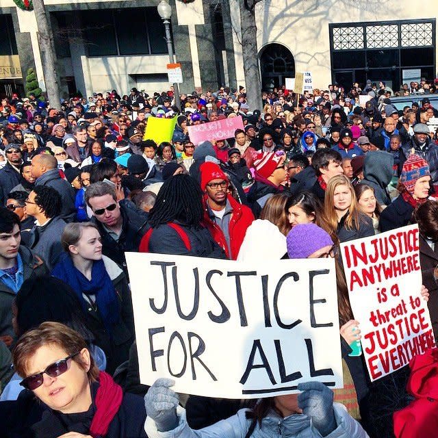 Protestors gather in Freedom Plaza in Washington, DC on Saturday, Dec. 13, 2014