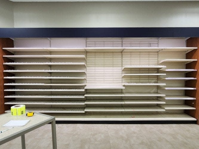 Empty shelves, perhaps a one-time resting place for various doodads.