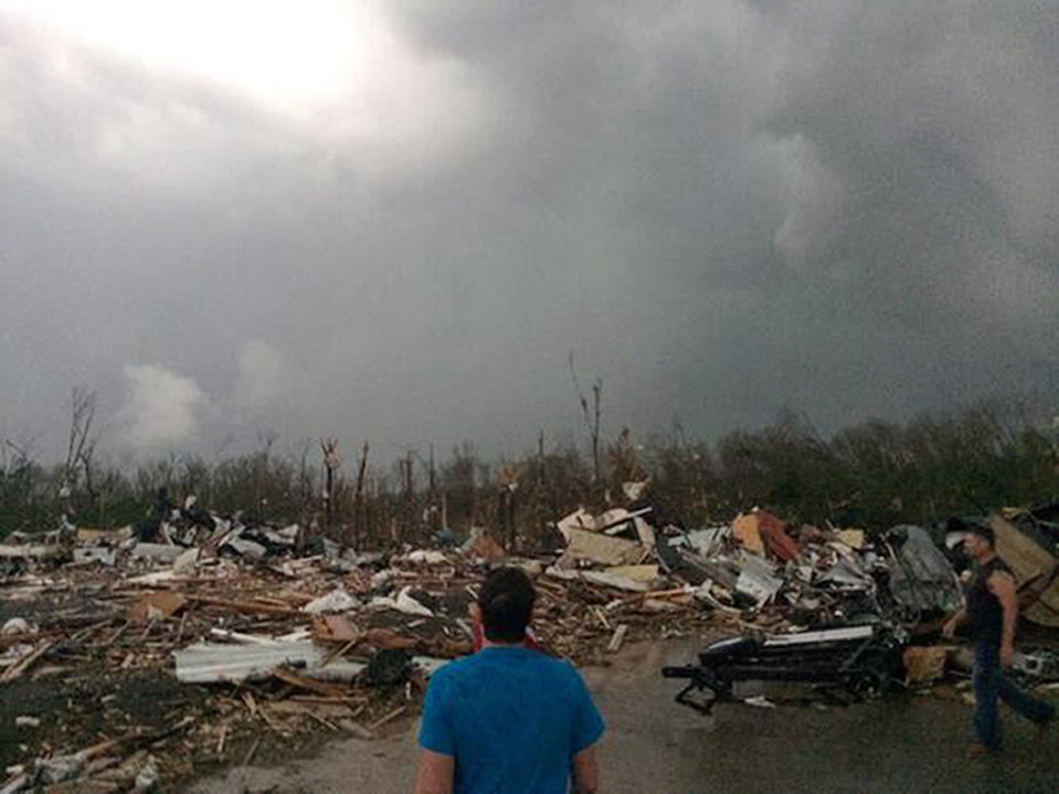 DELETES REFERENCE TO DEAQTH TOLL - This photo provided by James Bryant shows tornado damage, Sunday, April 27, 2014 in Mayflower, Ark. A powerful storm system rumbled through the central and southern United States on Sunday, spawning several tornadoes, including one in a small northeastern Oklahoma city and another that carved a path of destruction through several northern suburbs of Little Rock, Ark. (AP Photo/Courtesy of James Bryant) MANDATORY CREDIT