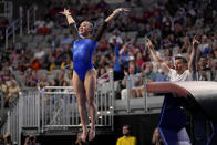 Florida's Leanne Wong celebrates after her vault routine during the NCAA women's gymnastics championships in Fort Worth, Texas, Thursday, April 18, 2024. (AP Photo/Tony Gutierrez)