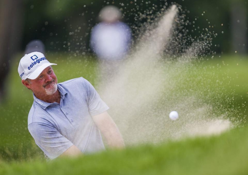 7/2/2019: Tribune Photo/ROBERT FRANKLINJerry Kelly blasts out of a bunker on the fifth hole during the final round of the U.S. Senior Open golf tournament Sunday in South Bend