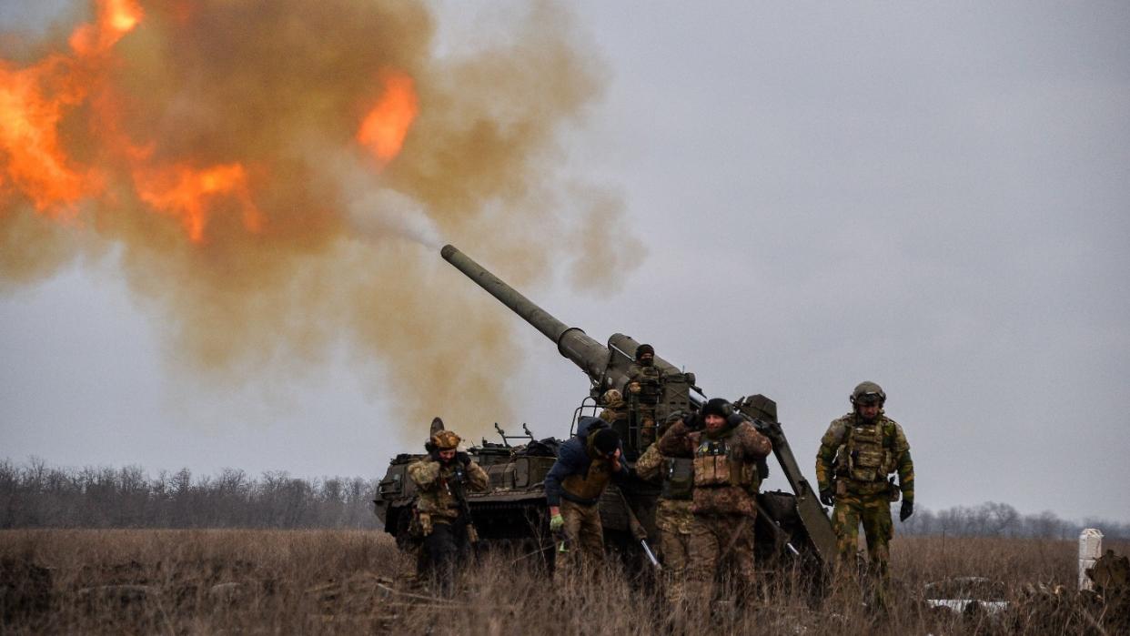  Ukrainian artillery teams fire Pions toward Russian positions in Bakhmut. 