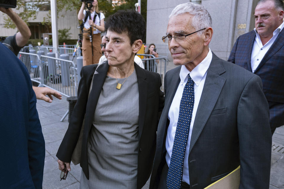 Barbara Fried and Joseph Bankman, parents of FTX founder Sam Bankman-Fried, leave a Manhattan federal courthouse on the opening day during the fraud trial of their son Bankman-Fried, Wednesday, Oct. 4, 2023, in New York. (AP Photo/Craig Ruttle)