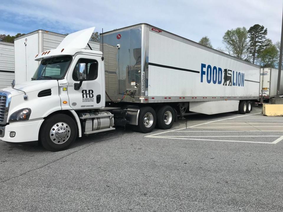 R.H. Barringer Distributing tractor truck is hooked up to a Food Lion trailer earlier this month at the Food Lion distribution center in Salisbury to help deliver food to stores. The distributing company has five locations in North Carolina.