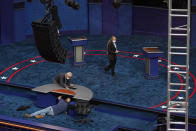 Preparations take place for the first Presidential debate in the Sheila and Eric Samson Pavilion, Monday, Sept. 28, 2020, in Cleveland. The first debate between President Donald Trump and Democratic presidential candidate, former Vice President Joe Biden is scheduled to take place Tuesday, Sept. 29. (AP Photo/Patrick Semansky)