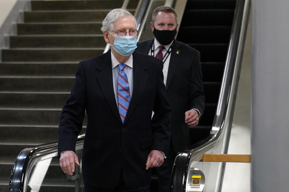 Senate Minority Leader Mitch McConnell of Ky., walks on Capitol Hill in Washington, Tuesday, Feb. 23, 2021. (AP Photo/Susan Walsh)