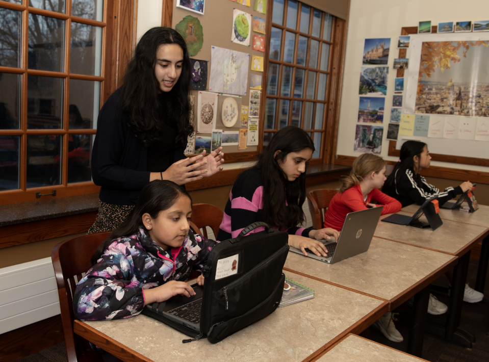 Riya Hegde, a junior at Western Reserve Academy in Hudson, recently started a project called Python Pals. Hegde, who received the NEO High School Microgrant Program to fund her endeavor, helps explain coding to Zoey Jain, 9.