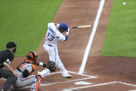 Toronto Blue Jays' Lourdes Gurriel Jr. hits a grand slam home run during the first inning of a baseball game against the Baltimore Orioles in Buffalo, N.Y., Thursday, June 24, 2021. (AP Photo/Joshua Bessex)