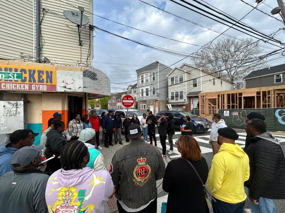 Family and friends of Rachel McNeil gather at North Main Street in Paterson.