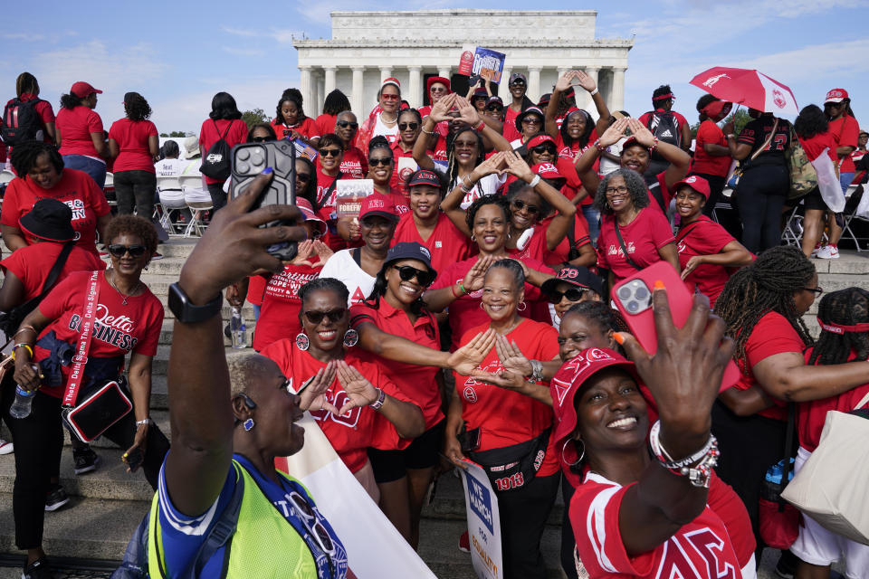 Members of Delta Sigma Theta Sorority Inc. pose for a photo in front of the Lincoln Memorial, Saturday, Aug. 26, 2023, in Washington, as they gather to commemorate the 60th anniversary of the March on Washington for Jobs and Freedom. The Rev. Al Sharpton, Martin Luther King, III, and Andrea Waters King have brought together 60 national organizations across racial, cultural, and generational lines as partners for the anniversary. (AP Photo/Jacquelyn Martin)