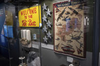 A display for the Central Intelligence Agency's work in Afghanistan shows the seven stars that were part of a larger memorial to the seven CIA officers killed in the line of duty on Dec. 30, 2009, at Forward Operation Base Chapman is seen in the newly refurbished museum in the CIA's headquarters building in Langley, Va., on Saturday, Sept. 24, 2022. (AP Photo/Kevin Wolf)