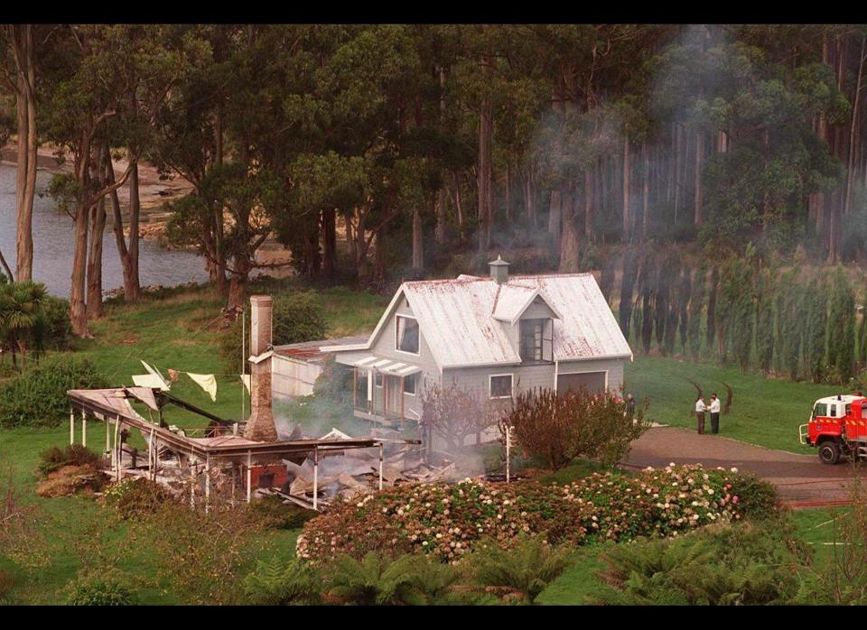 Martin Bryant unleashes modern Australia's worst mass murder when he shoots dead 35 people at the Port Arthur tourist site in the southern state of Tasmania.<br>  <em>Caption: Photo dated 29 April, 1996, showing the remains of the guesthouse in Hobart, from which a gunman, identified as Martin Bryant, killed 34 people and injured 19 others. (WILLIAM WEST/AFP/Getty Images)</em>