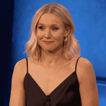 Kristen Bell shrugging