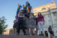 LGBT supporters protest in Warsaw