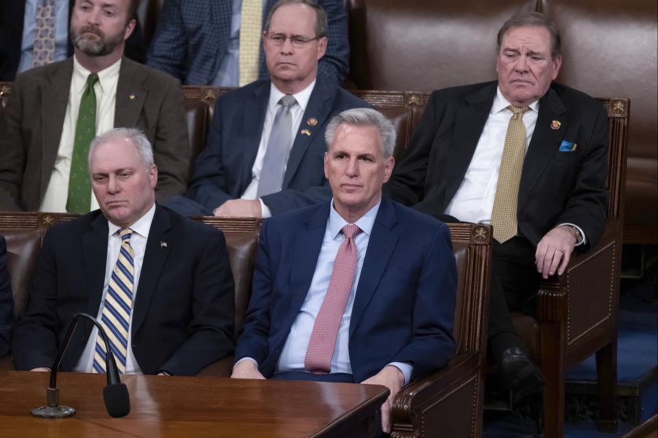 FILE - House Republican Leader Kevin McCarthy, R-Calif., sits with Minority Whip Steve Scalise, R-La., left, before an address by Ukrainian President Volodymyr Zelenskyy in the House chamber, at the Capitol in Washington, Wednesday, Dec. 21, 2022. The new 118th Congress, with Republicans in control of the House, begins Jan. 3, 2023, but the first task for the GOP is electing a new speaker and whether House Republican Leader Kevin McCarthy, R-Calif., can overcome opposition from conservatives in his own ranks to get the job. (AP Photo/J. Scott Applewhite, File)