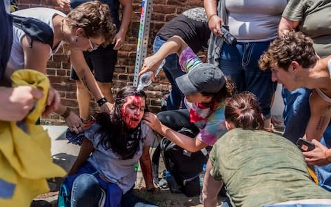 White supremacist groups clashed with hundreds of counter-protesters during the "Unite The Right" rally in Aug 2017 in Charlottesville - Credit: Michael N/Pacific/BarcroftImages