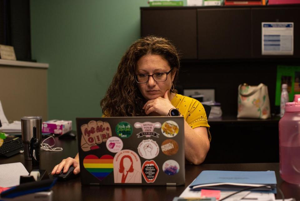 Andrea Gallegos speaks with a few of her employees after the Supreme Court overturned Roe v. Wade at the Alamo Women’s Reproductive Services abortion clinic in San Antonio on June 24, 2022.