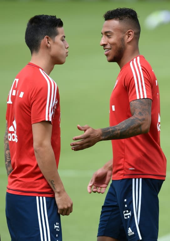 Bayern Munich's new signings, Colombian midfielder James Rodriguez (L) and French midfielder Corentin Tolisso, attend a training session in Munich, southern Germany, on July 13, 2017