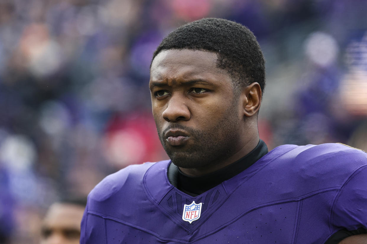 BALTIMORE, MD - JANUARY 28: Roquan Smith #0 of the Baltimore Ravens looks on from the sideline during the national anthem prior to the AFC Championship NFL football game against the Kansas City Chiefs at M&T Bank Stadium on January 28, 2024 in Baltimore, Maryland. (Photo by Perry Knotts/Getty Images)