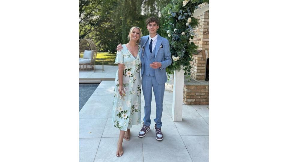 Stacey Solomon in formal attire with her son Zachary