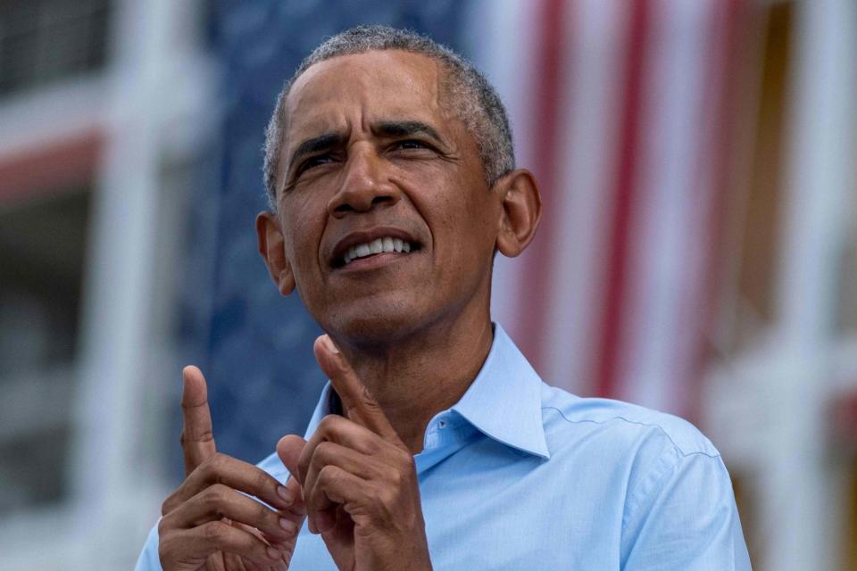 Former US President Barack Obama speaks at a Biden-Harris drive-in rally in Orlando, Florida: AFP via Getty Images