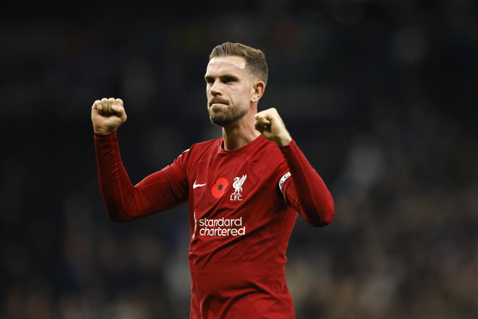 Liverpool's Jordan Henderson celebrates after winning the English Premier League soccer match between Tottenham Hotspur and Liverpool at Tottenham Hotspur Stadium, in London, Sunday, Nov. 6, 2022. Liverpool won 2-1. (AP Photo/David Cliff)