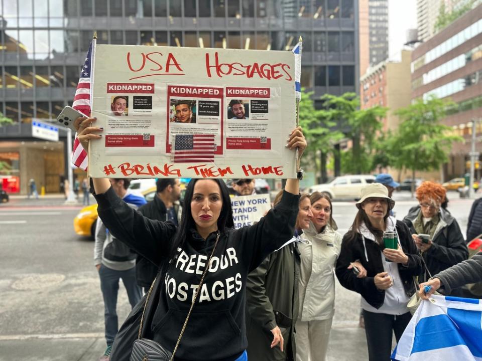 Protester Vivace Maxvictor was one of several demonstrators to call for Schumer’s resignation. Steve Vago/NY Post