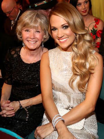 <p>Christopher Polk/ACMA2014/Getty</p> Carrie Underwood and Carole Underwood attend the 49th Annual Academy of Country Music Awards on April 6, 2014 in Las Vegas, Nevada.