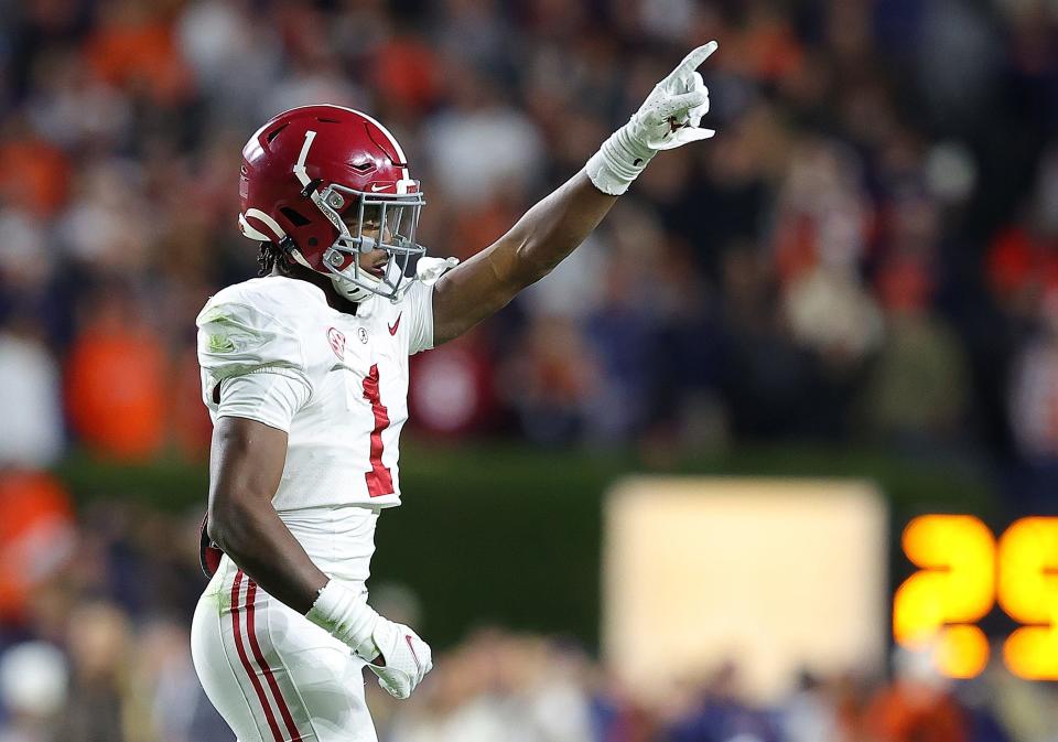 AUBURN, ALABAMA - NOVEMBER 27: Kool-Aid McKinstry #1 of the Alabama Crimson Tide reacts a defensive stop in the third overtime against the Auburn Tigers at Jordan-Hare Stadium on November 27, 2021 in Auburn, Alabama. (Photo by Kevin C. Cox/Getty Images)