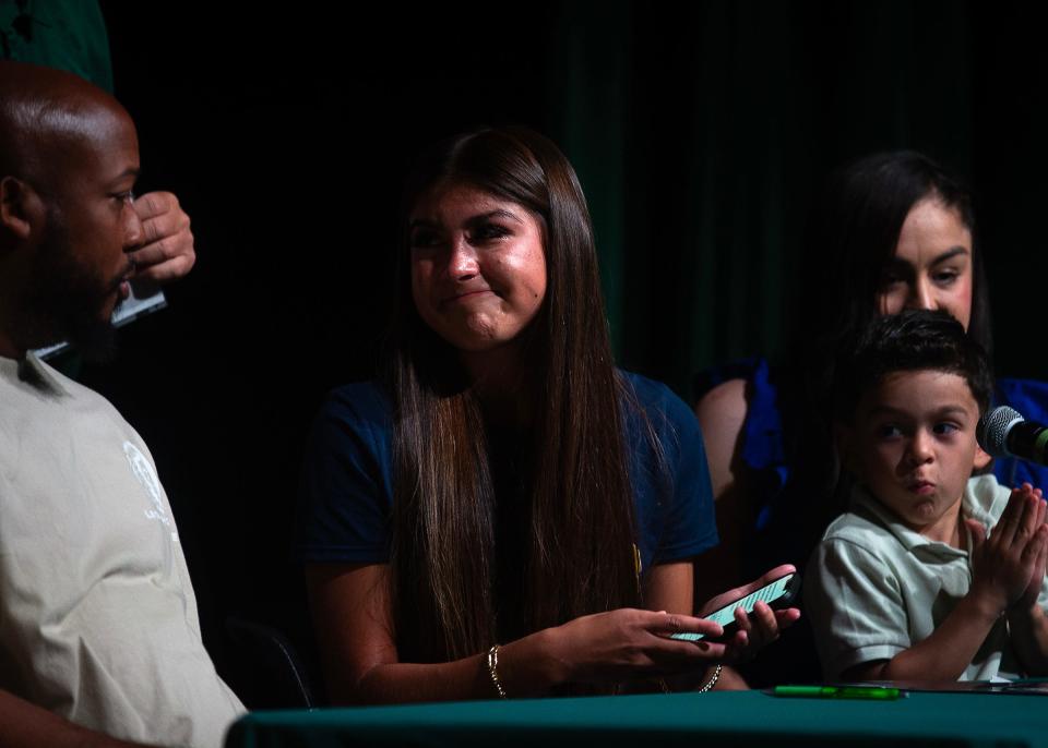 Sherilyn Sanchez, a senior at A. Crawford Mosley High School in Lynn Haven, Fla., signs her letter of intent April 17, 2024, to continue her education and basketball career at Warner University. (Tyler Orsburn/News Herald)