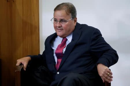 Brazilian minister Geddel Vieira Lima gestures during a meeting with deputies and government leaders of the Chamber of Deputies, in his office at the Planalto Palace in Brasilia, Brazil, November 22, 2016. REUTERS/Ueslei Marcelino