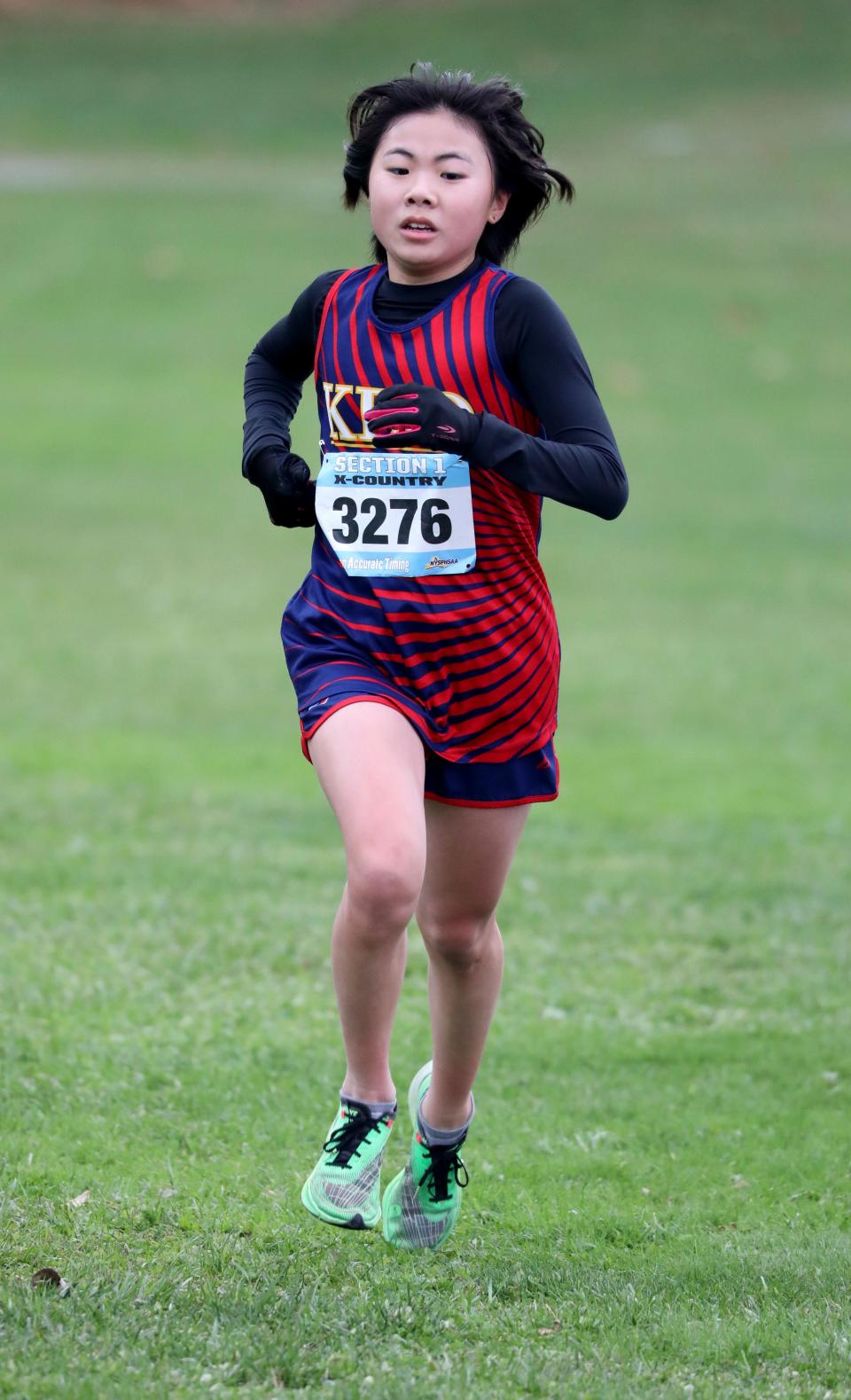 Nana Tsunemi from Keio Academy of New York approaches the finish line as athletes compete in the girls Class D Section 1 Cross Country Championships at Bowdoin Park in Wappingers Falls, Nov. 4, 2023.