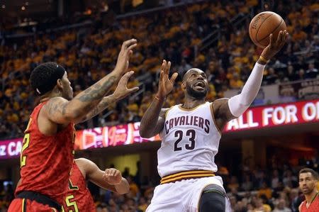 May 4, 2016; Cleveland, OH, USA; Cleveland Cavaliers forward LeBron James (23) shoots a layup during the second quarter in game two of the second round of the NBA Playoffs at Quicken Loans Arena. Mandatory Credit: Ken Blaze-USA TODAY Sports