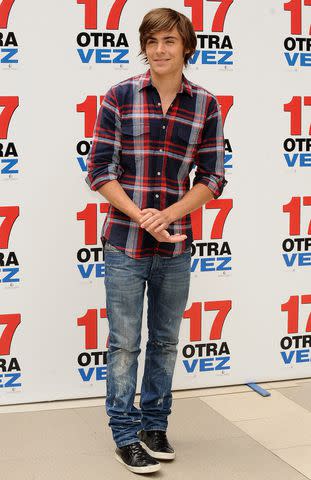 <p>Carlos Alvarez/Getty</p> Zac Efron in 2009 premiering '17 Again'