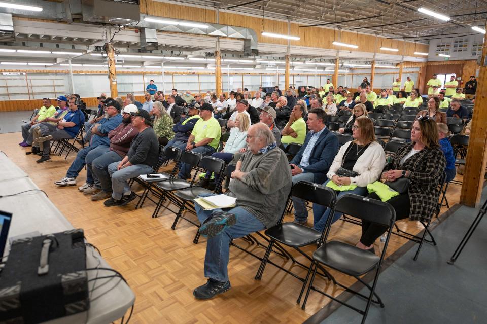 Community members listen to a presentation during a town hall meeting regarding the future of nuclear energy in Pueblo at the Colorado State Fairgrounds on Wednesday, March 27, 2024.