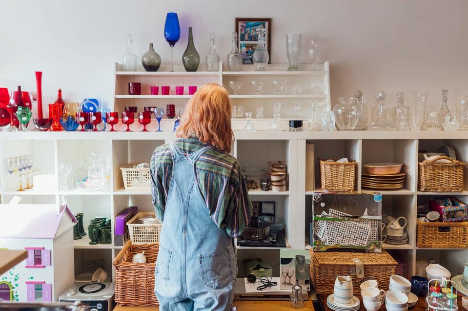 woman shopping in thrift store