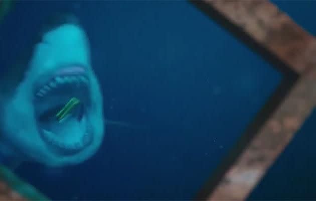 This shark is so hungry he even eats their camera. Source: Dimension Films